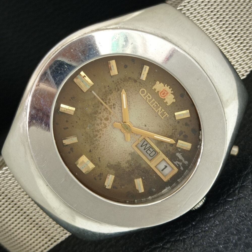Vintage 1979 Orient Automatic Mens Silver Watch W/daydate & Gold accents